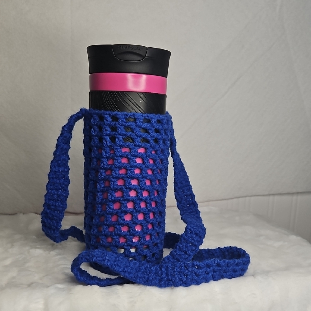 Blue Crochet Bottle Holder with Pink and Black Tumbler